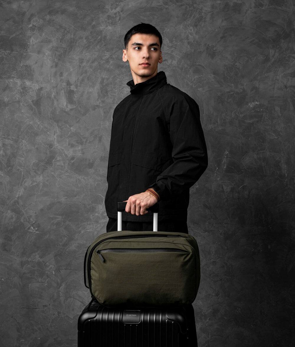 Left. ALPAKA - Metro Backpack Pro 24L Laptop Backpack for Men, Backpack with Laptop Compartment (16"), 3-Zone Storage - Green Axoflux 400D Ripstop Nylon.