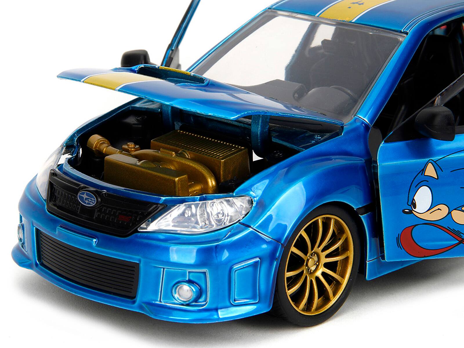 Left. Jada - 2012 Subaru Impreza WRX STI Blue Metallic with Graphics & Sonic The Hedgehog Diecast Figure 1/24 Hollywood Rides - Blue Metallic.