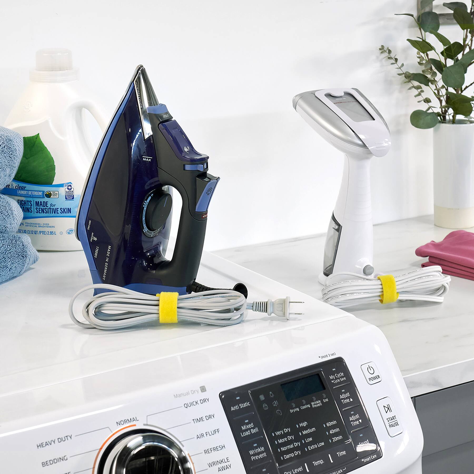 The text on the image is a description of a product called "Coleman Manual Dry Adjust & Dry" which is designed for people with sensitive skin. It features a quick anti-static drying cycle, adjustable drying time, and a refresh wrinkle prevent cycle. The product is suitable for mixed fabrics and has a low temperature dry setting. The drying time ranges from 5 to 50 minutes, with a pause function for added convenience. The product also has a load bell and a timer to ensure that the drying process is completed efficiently.