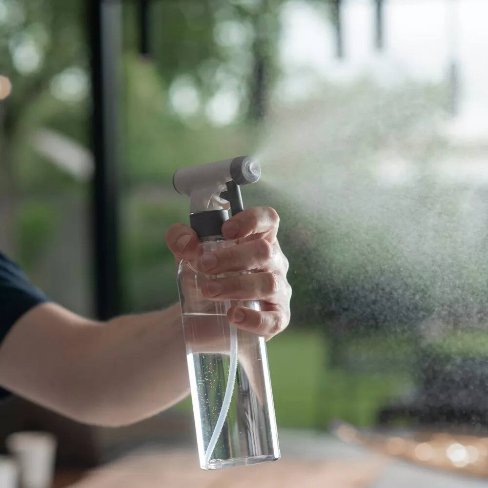 Angle. OU - OU Reusable Cleaning Spray Bottle - 16 oz, Adjustable Nozzle & Safety Lock, Multipurpose Cleaning.