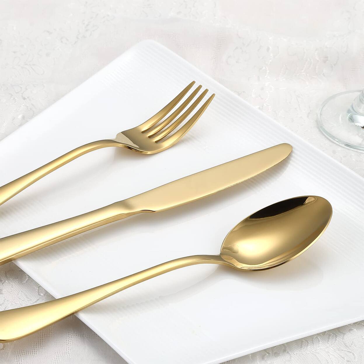 Angle. Dazzed Corner - Silverware Set for 8, 40-Piece Gold Flatware Set Stainless Steel Cutlery Kitchen Utensil Set - Gold.