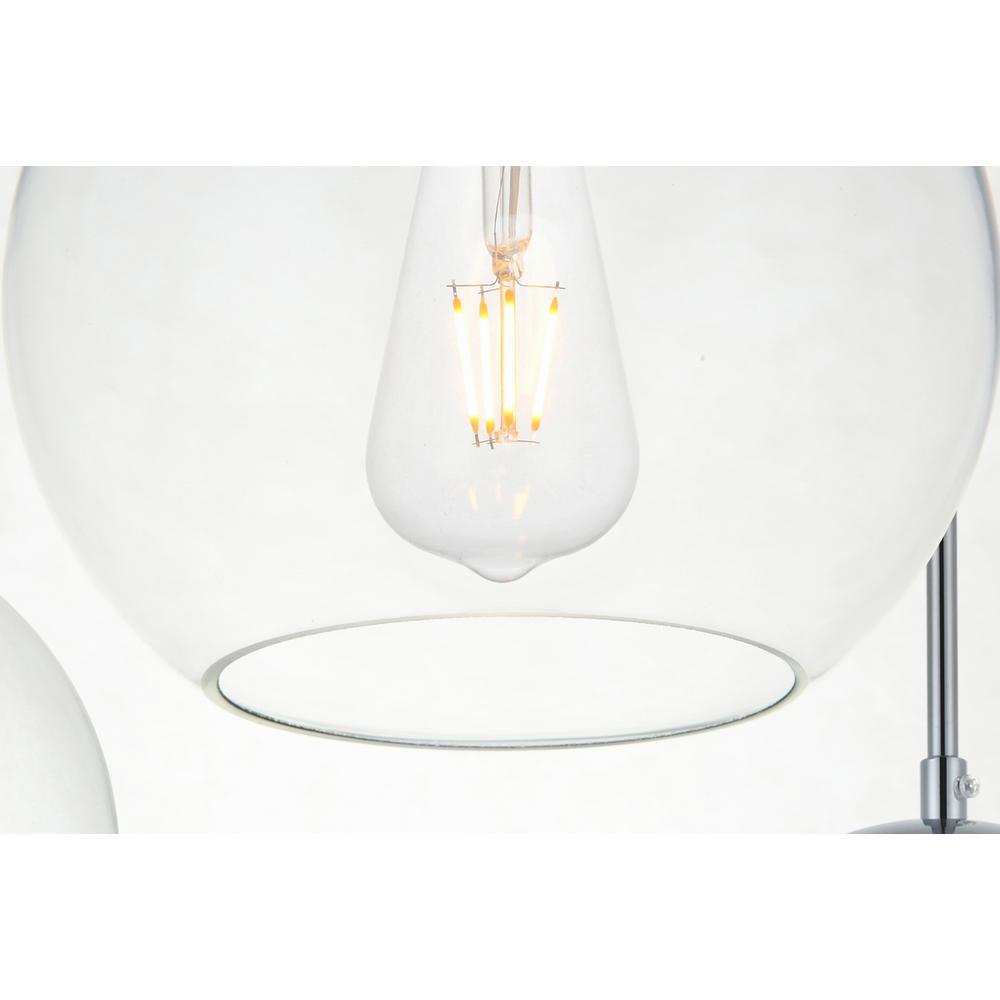 Left. Living District - Baxter 7 Lights Chrome Pendant With Clear Glass - Chrome And Clear.