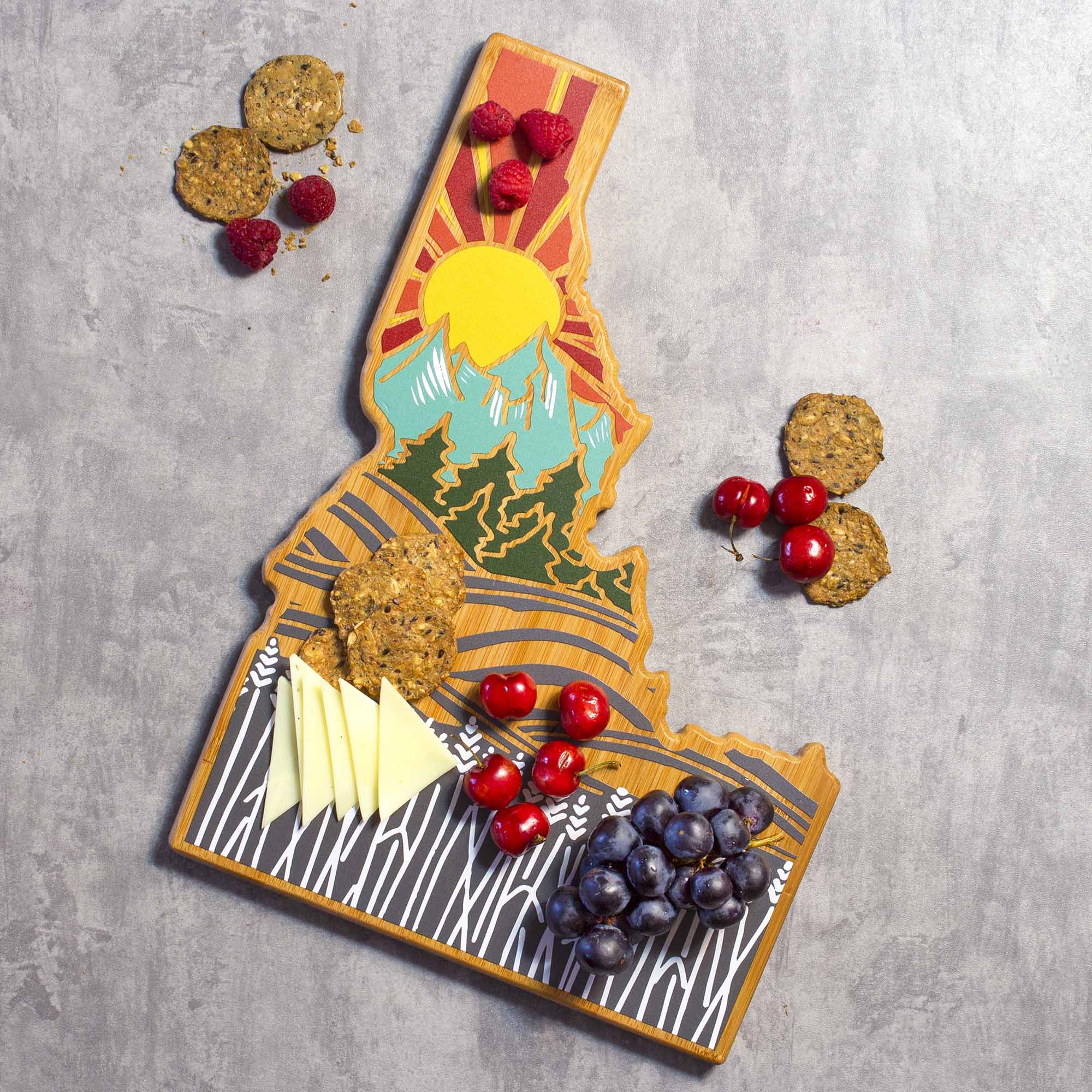 Angle. Totally Bamboo - Idaho Cutting Board with Artwork by Summer Stokes.