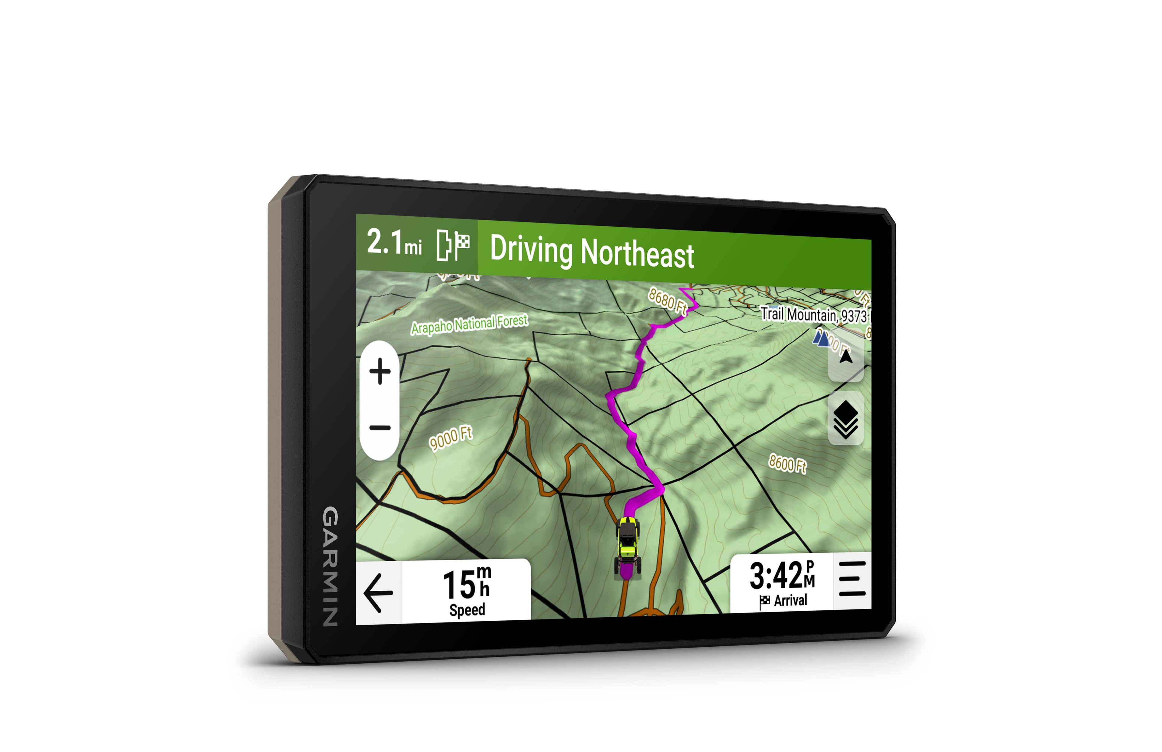 The text on the image reads: "2.1 mi Driving Northeast 8680 Ft National Forest Arapaho + UF Trail Mountain, 9373 8  GARMIN - 9000 Ft m 15h h Speed 8600 FB 3:42 M Arrival." This information is likely displayed on a Garmin device, showing the user's current location and the direction they are heading in. The device is also displaying the estimated time of arrival at their destination.