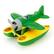 A green toy airplane with a propeller on the front, sitting on a yellow stand.
