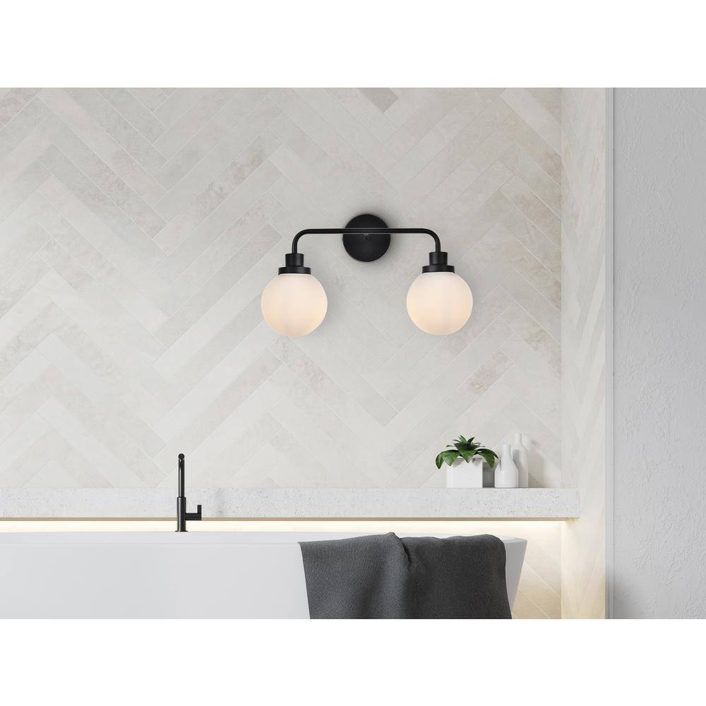 Angle. Living District - Hanson 2 lights bath sconce in black with frosted shade - Black And Frosted Shade.