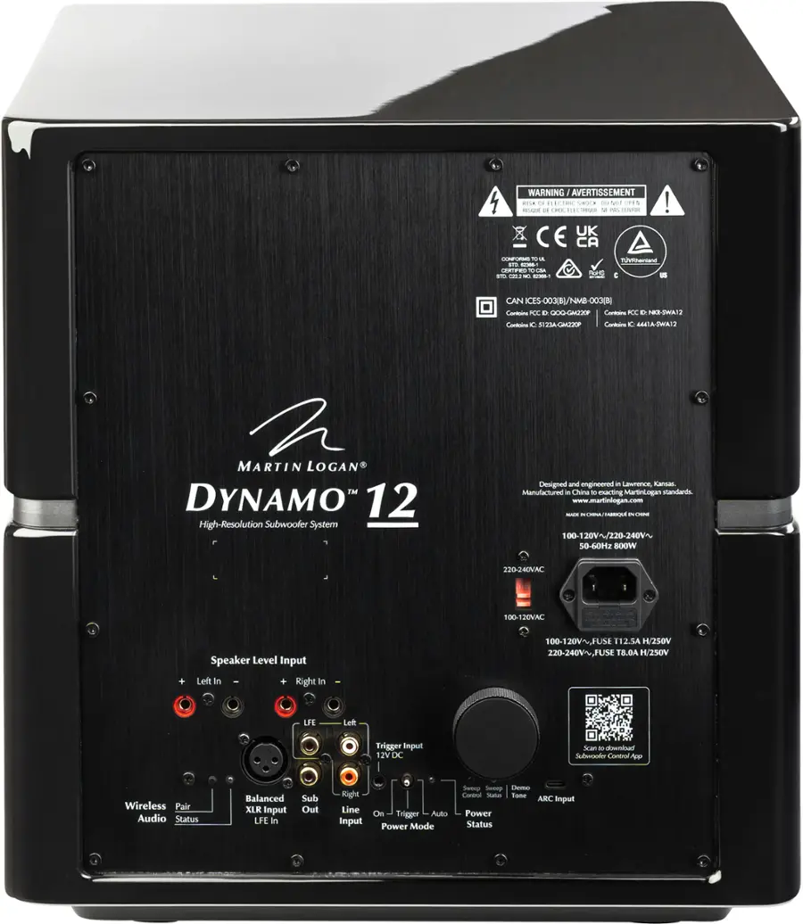 The text on the image is already grouped and corrected. The text reads:

"WARNING: IMPORTANT - READ CAREFULLY

This product is designed and engineered by Lawrence Canas. Manufactured in China.

DYNAMO 12 High-Resolution Subwoofer System

Designed and engineered by Lawrence Canas
Manufactured in China

100-120V~/220-240V 50-60Hz
8OOW 220-240VAC 100-120VAC

Speaker Level Input Left in Right in 100-120V~HUS 112.SA H/250V 220-240V~,FUSE T8.0A H/250V
LFE Lett Trigger Input 12V DC
Subwoofer Control App Wireless Pair Audio Status
Balanced XLR Input LFE in Sub Out Right Line Input On Trigger
Auto Power Mode Sam Sweep Demo Coil Stator Value Roe ARC Input Power Status"
