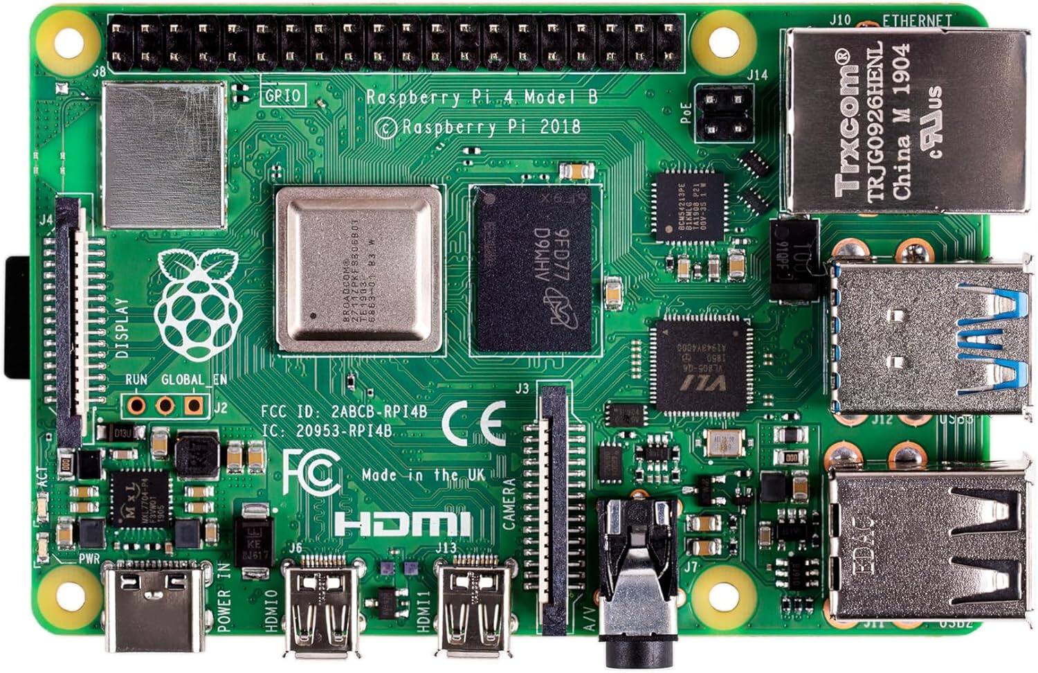 Raspberry Pi 4 Model B  
© Raspberry Pi 2018  

J4 ACT  
J8 GPIO  

FCC ID: 2ABCB-RPI4B  
IC: 20953-RPI4B  

CE  
FC  

Made in the UK  

J10 ETHERNET  
J14  

Trxcom  
TRJG0926HENL M 1904  
China  

ABC-B-RPI4B  
RPI4B  

DISPLAY  
RUN  
GLOBAL EN  
J2  

HDMI  
J13  

POWER  
J6  

CAMERA  
J12  

POE  
J11  

MXL7704-P4  
OMAE  

A1943Y4000  
9D-G08-A  

TA1508  
00V-35  

9FD77  
BROADCOM  
TE1933  

D9MHV  
9FD77  

2711ZPKF9806B0T  
3 AHM60  

MXL  
China  

J1Z  
doKU  
EDAC  
JIT  
zaso  

J7  
9