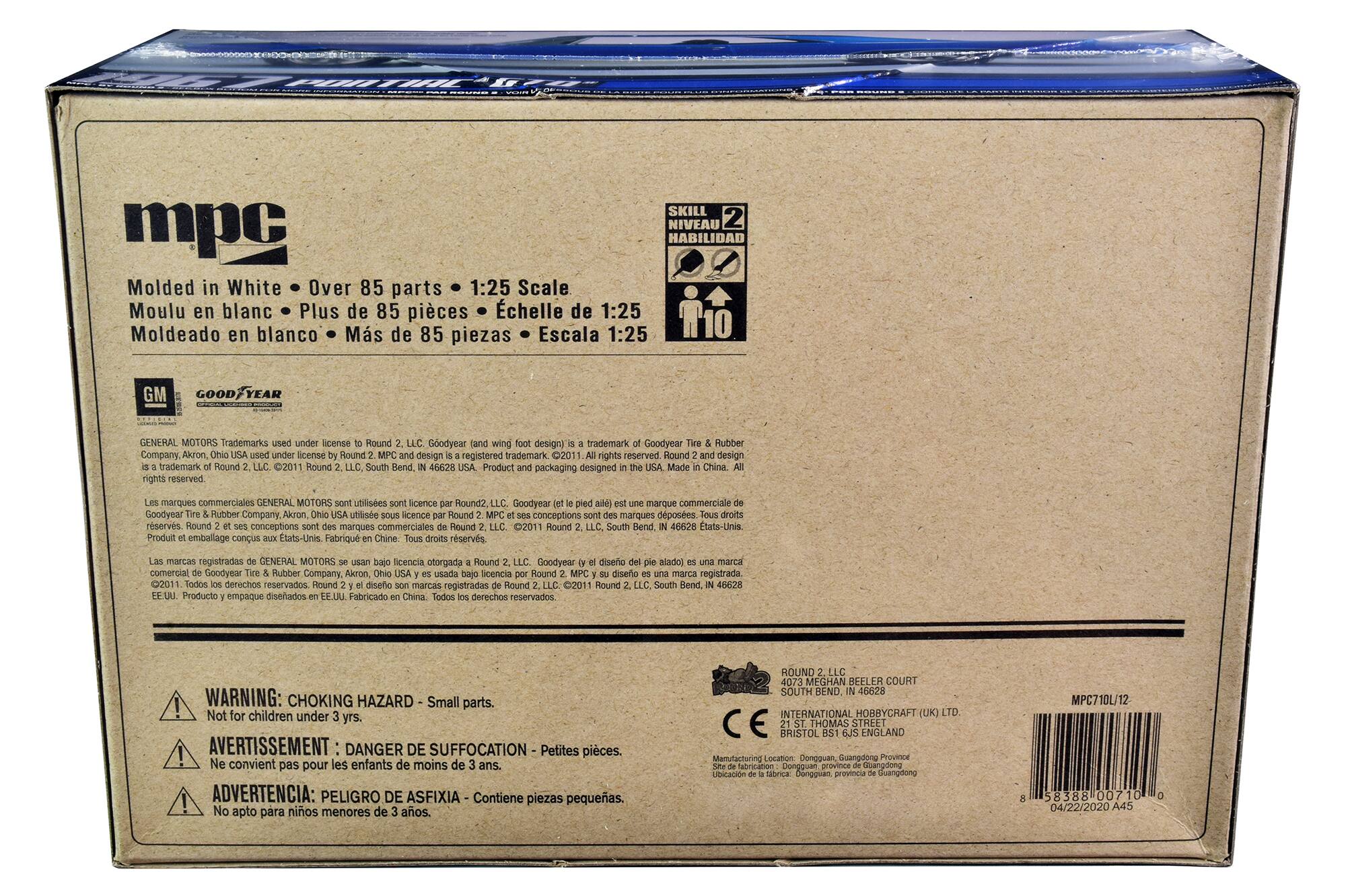 Sure, here is the corrected and grouped text from the image:

---

**MPC**

**Molded in White • Over 85 parts • 1:25 Scale**  
**Moulu en blanc • Plus de 85 pièces • Échelle de 1:25**  
**Moldeado en blanco • Más de 85 piezas • Escala 1:25**

**SKILL LEVEL 2**  
**NIVEAU 2**  
**HABILIDAD 2**

**GM GOOD YEAR**  
**GENERAL MOTORS Trademarks used under license to Round 2, LLC. Good Year (land wing foot design) is a trademark of Goodyear Tire & Rubber Company, Akron, Ohio USA. Used under license by Round 2. MPC and design are a registered trademark of Round 2, LLC, South Bend, IN 46628. Product and packaging designed in the USA. Made in China.**  
**Les marques commerciales GENERAL MOTORS sont utilisées sous licence par Round 2, LLC. Good Year (le pied ailé) est une marque commerciale de Goodyear Tire & Rubber Company, Akron, Ohio USA. Util