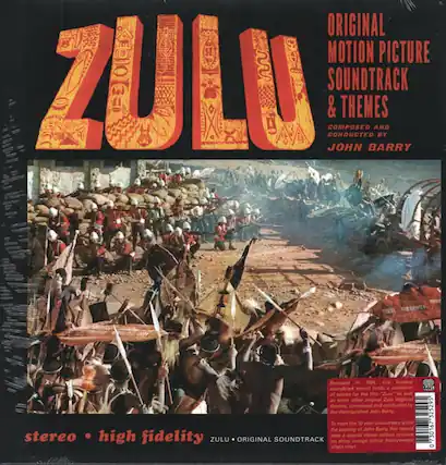 **ZULU**
**ORIGINAL MOTION PICTURE SOUNDTRACK & THEMES**
**COMPOSED AND CONDUCTED BY JOHN BARRY**
Released in 1964, this famous soundtrack record holds a collection of scores for the film "Zulu" as well as some other original Zulu-inspired themes, composed and conducted by the distinguished John Barry.
To mark the 10-year anniversary since the passing of John Barry, this record stereo high fidelity ZULU ORIGINAL SOUNDTRACK sees a special stereo colour edition heavyweight re-issue on shiny orange virgin vinyl.
**stereo • high fidelity**
**ZULU • ORIGINAL SOUNDTRACK**