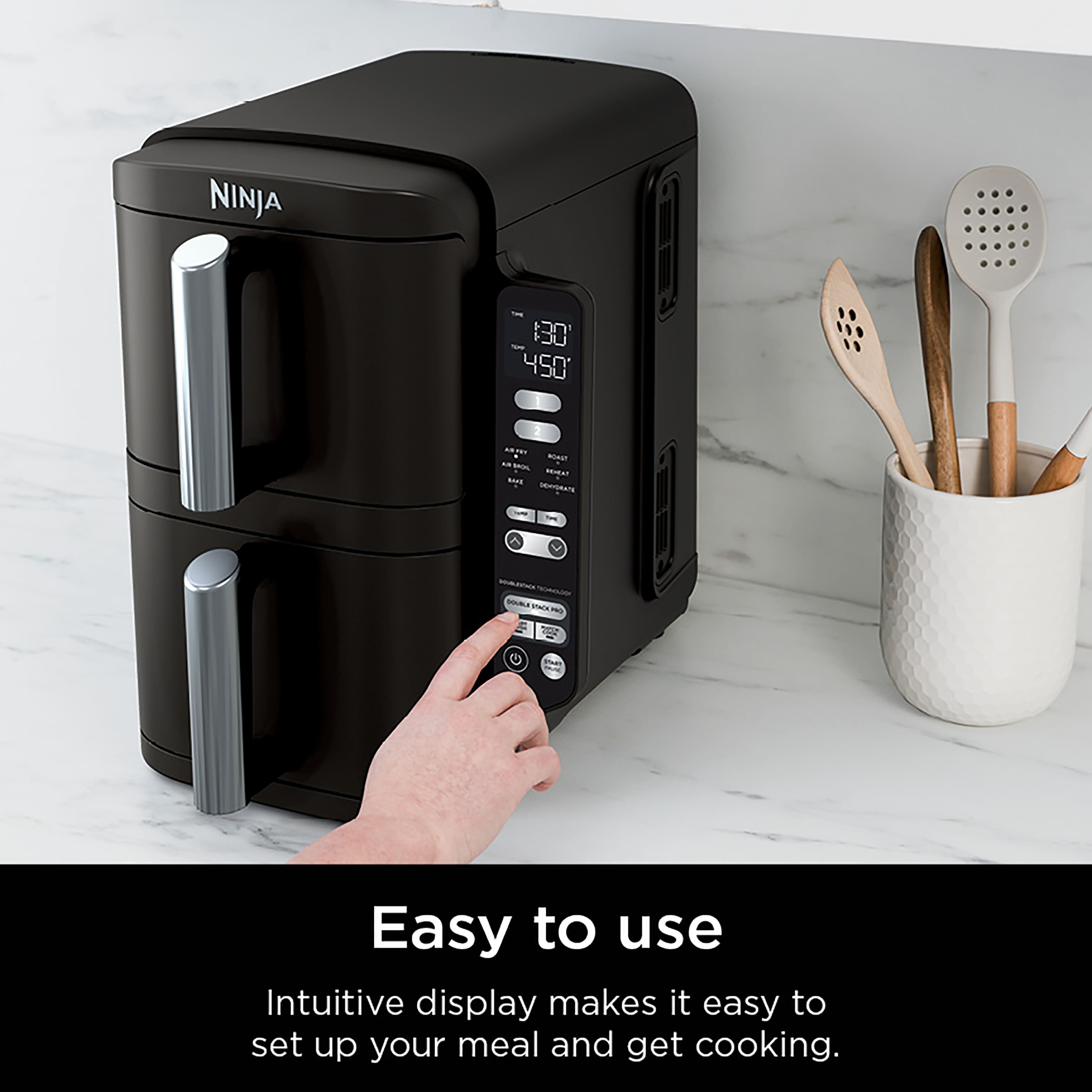 The text on the image reads: "NINJA 30 450 - Easy to use Intuitive display makes it easy to set up your meal and get cooking."