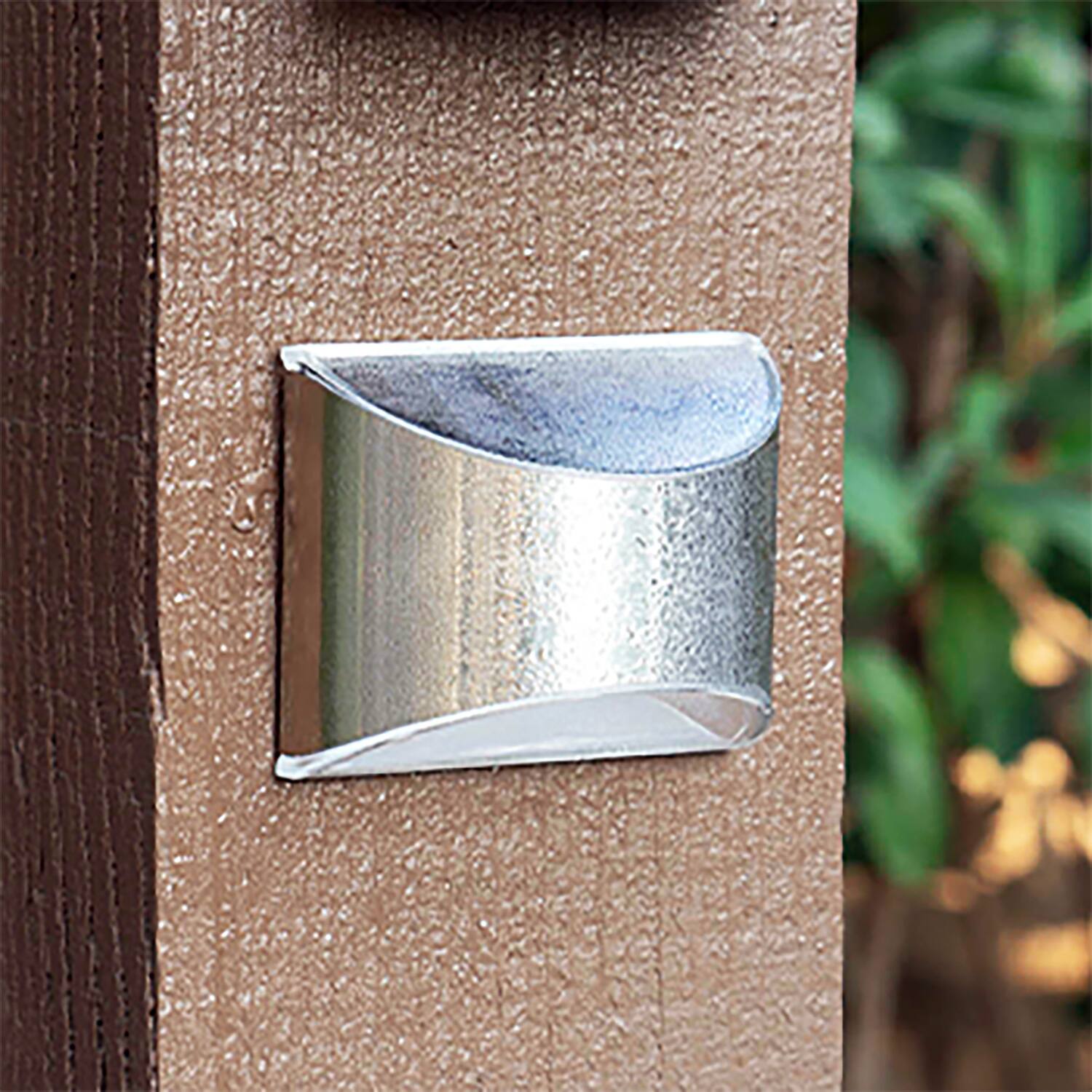 Left. Home Zone Security - 4-Pack Decorative Outdoor Solar Wall Lights for Wall, Fence Post, or Step - Silver.