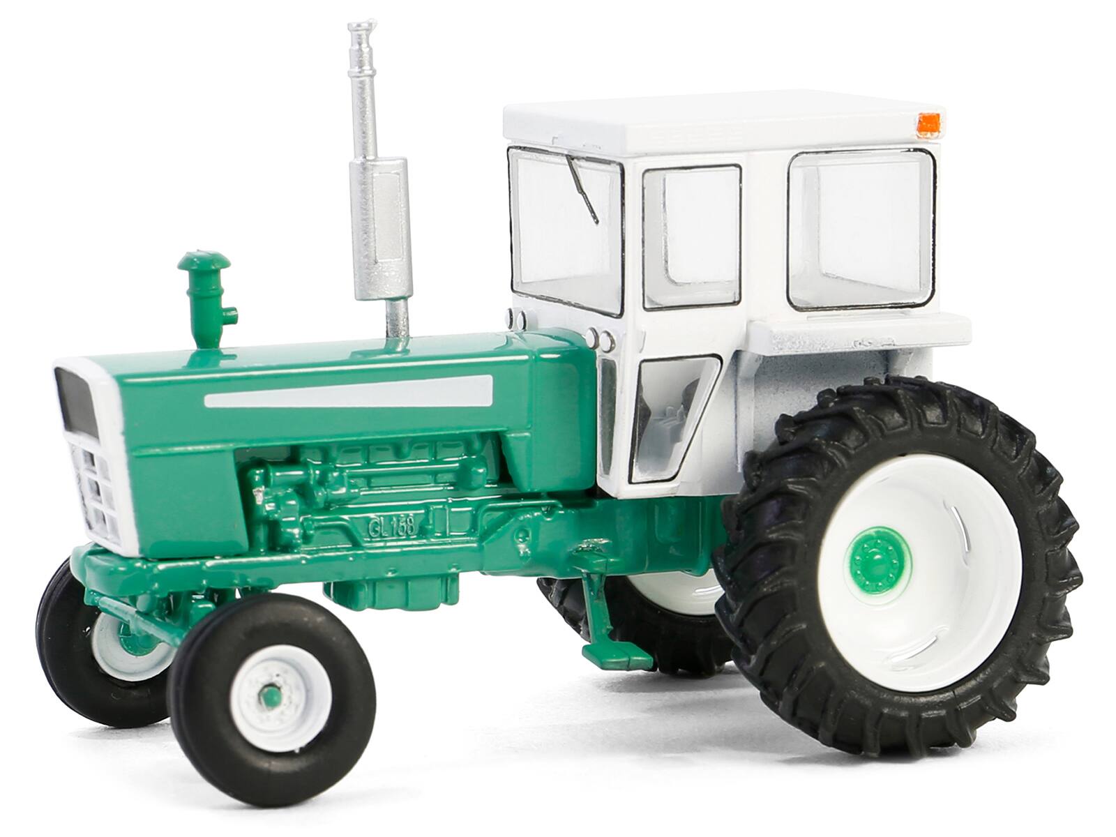 Angle. Greenlight - 1973 Tractor with Closed Cab Green and White "Down on the Farm" Series 9 1/64 Diecast Model by Greenlight - Green And White.