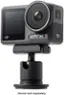 The image shows a black camera with a lens attached to a tripod. The camera is an Action 3, and the lens is sold separately.