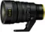 The text on the image reads "2 NIKKOR 28 I 135 POWER ZOOM T W A M L-Fn S ARL." This text is likely a description of the camera lens, indicating its brand, model, and features.