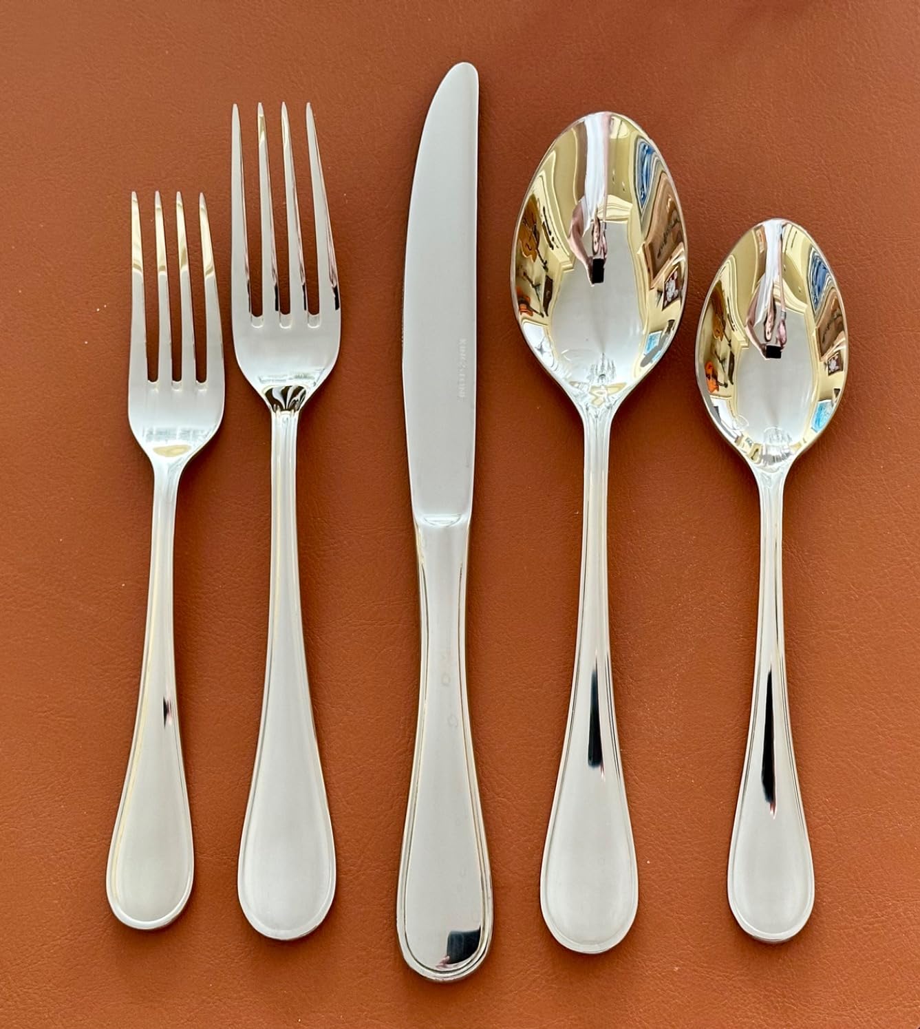 Angle. Dazzed Corner - 20 Piece Silverware Set for 4, 1Stainless Steel Flatware Set - Silver.