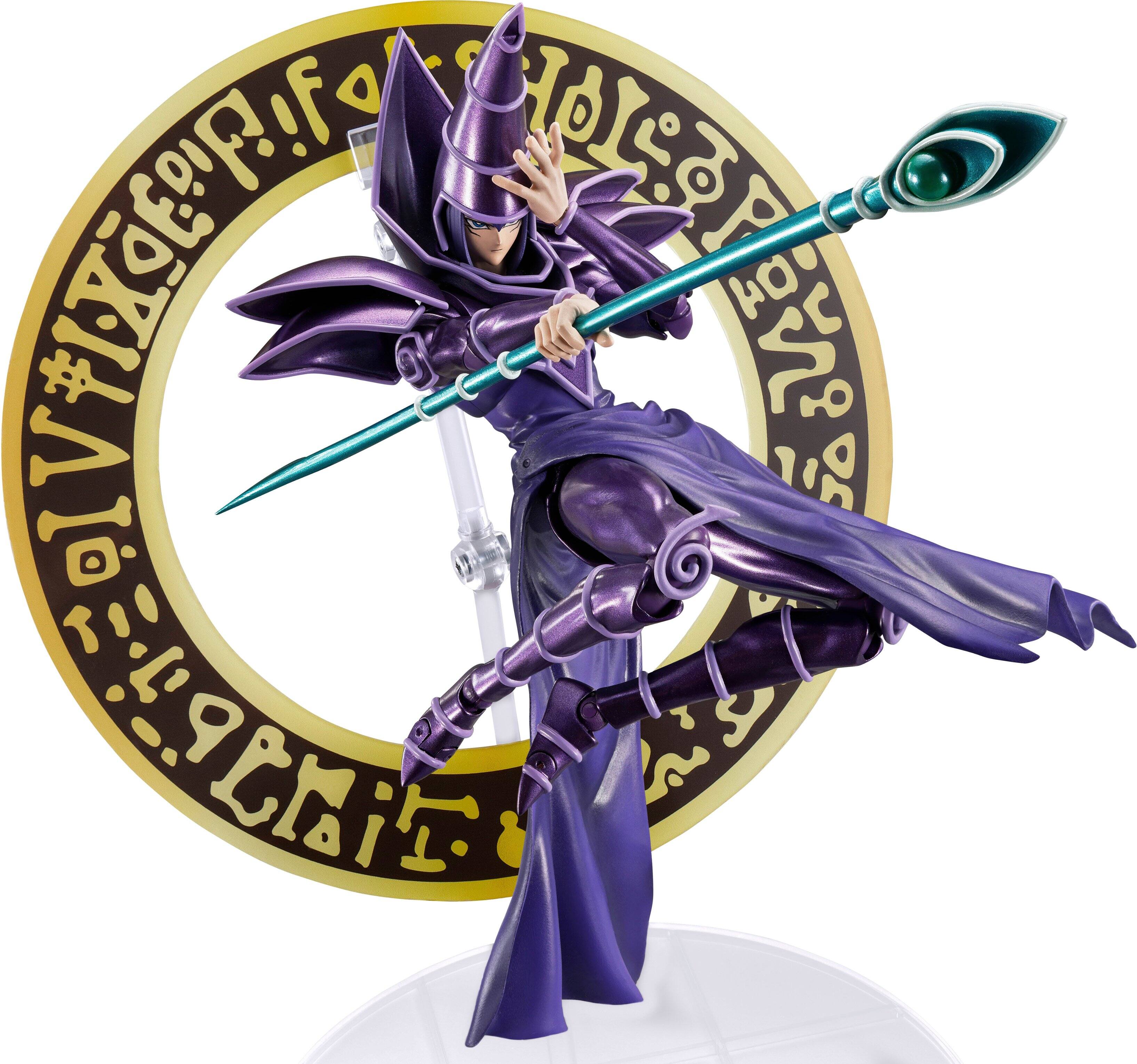 The text on the image reads: "Videogame figure of a character from the game Valkyrie Profile. The character is holding a sword and wearing a purple outfit."
