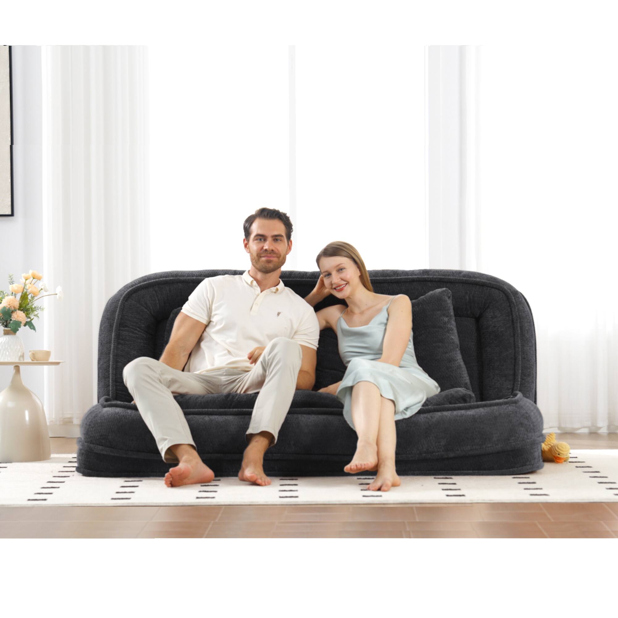 Angle. GOODSILO - Extra Large Convertible Floor Sofa Bed with Adjustable Backrest for Comfortable Lounging and Napping - Black.