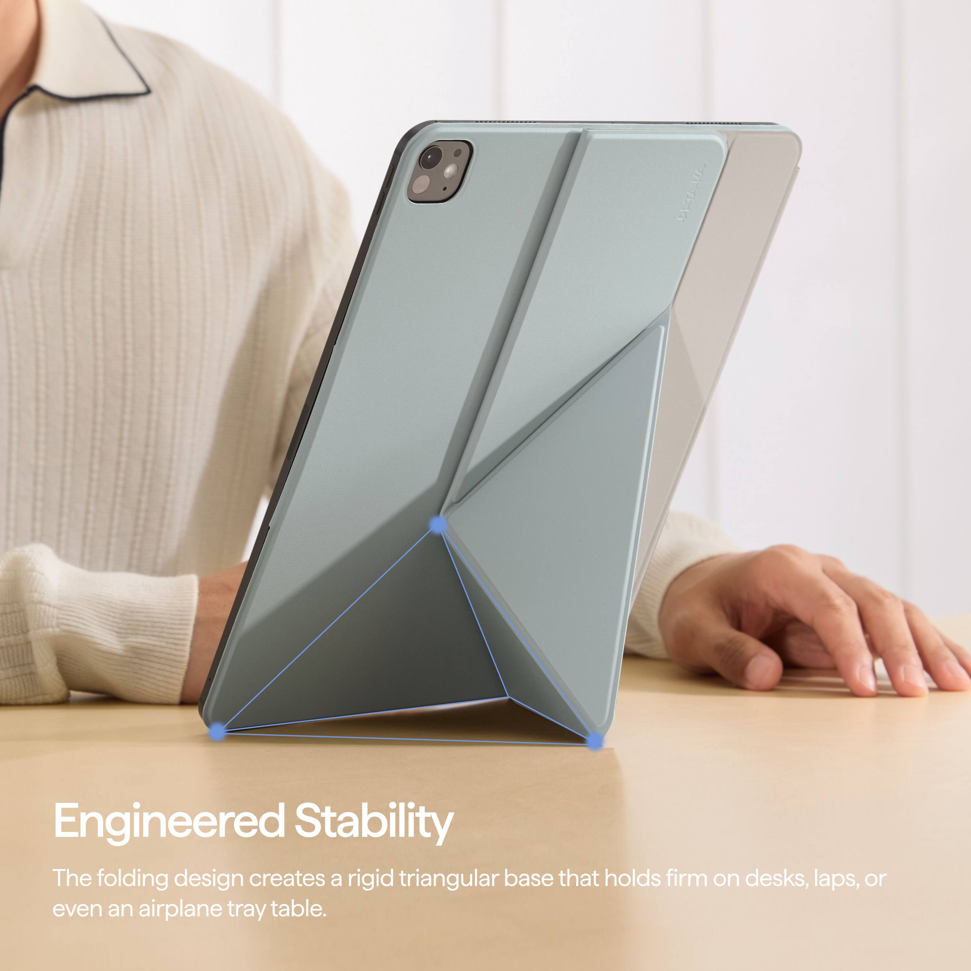 Engineered Stability  
The folding design creates a rigid triangular base that holds firm on desks, laps, or even an airplane tray table.