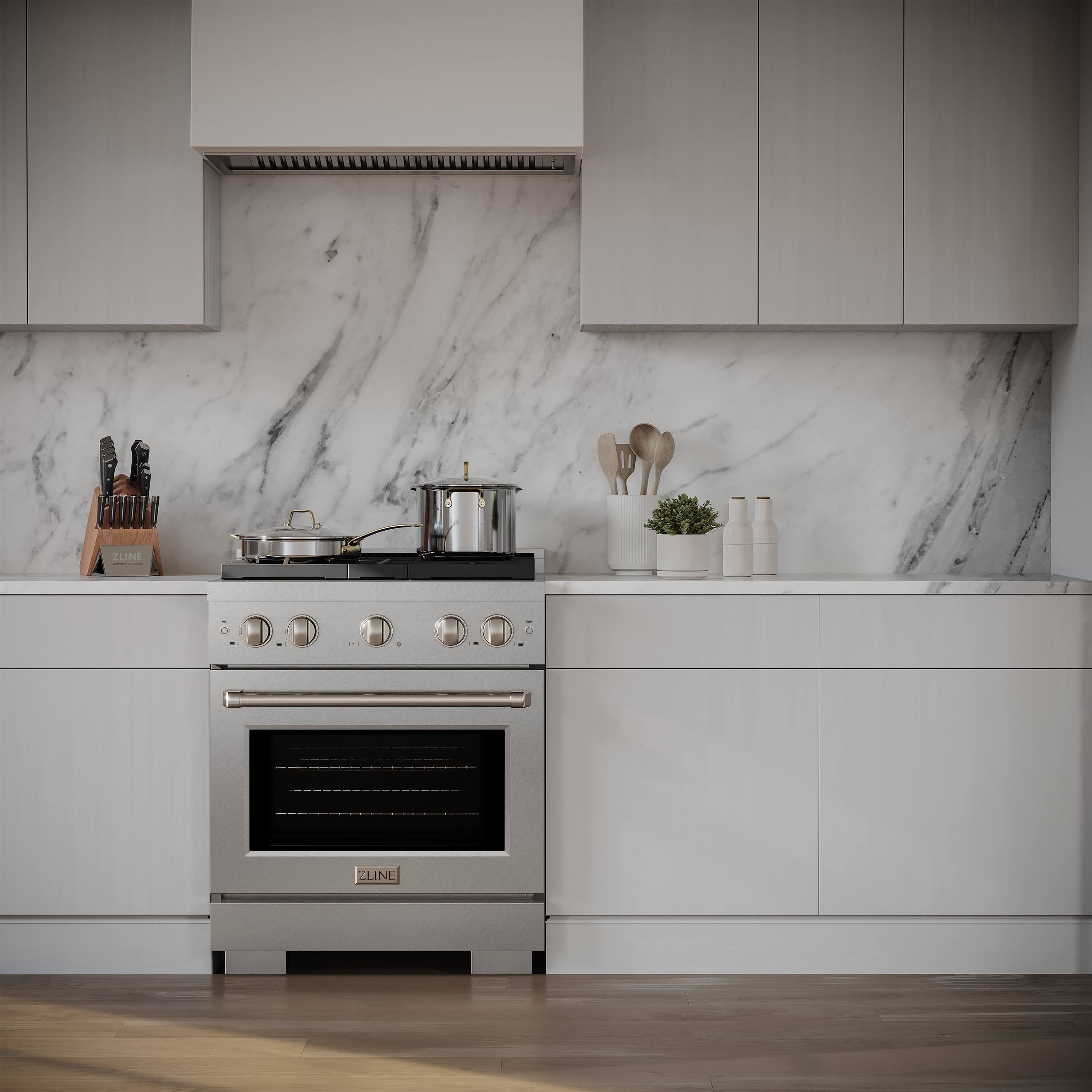 The text on the image reads "21 ZUINI . LNE." However, it is not clear what this text represents or its relevance to the image. The image features a kitchen with a stove top oven, a counter, and various items such as a pot, a knife, a spoon, and a potted plant.