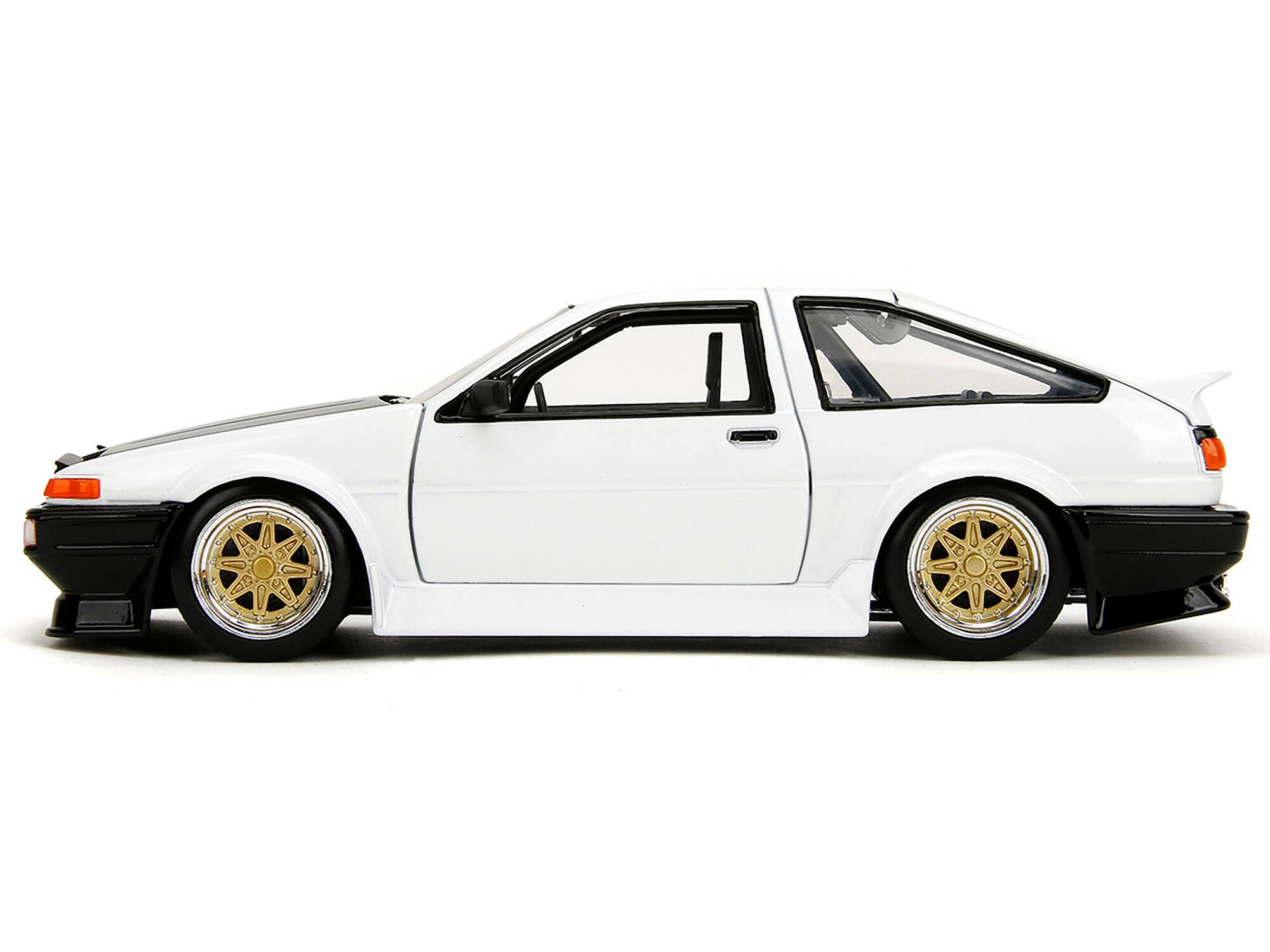 Left. Jada - 1986 Toyota Trueno (AE86) RHD (Right Hand Drive) White with Black Hood "JDM Tuners" Series 1/24 - White With Black.