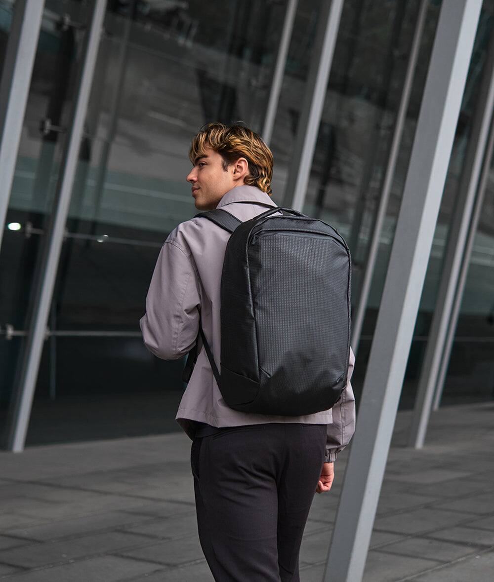 Alt View 10. ALPAKA - Lightweight 22L Laptop Backpack for 16-inch Laptop, Momentum Backpack for Work, Travel & Commuting, Weather-Resistant - Axodyne hybrid Black.