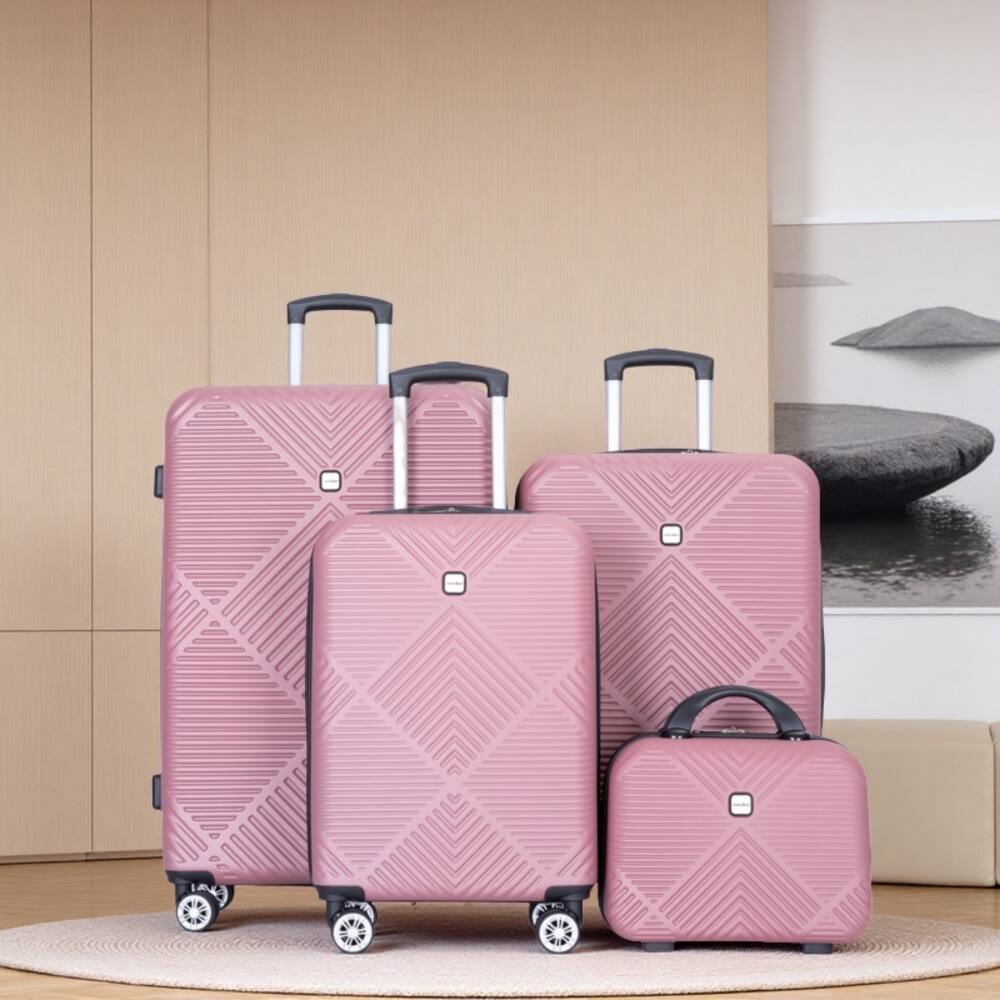 Angle. BreeBe - 4-Piece ABS Lightweight Luggage Set with Makeup Box and Spinner Wheels - Pink.