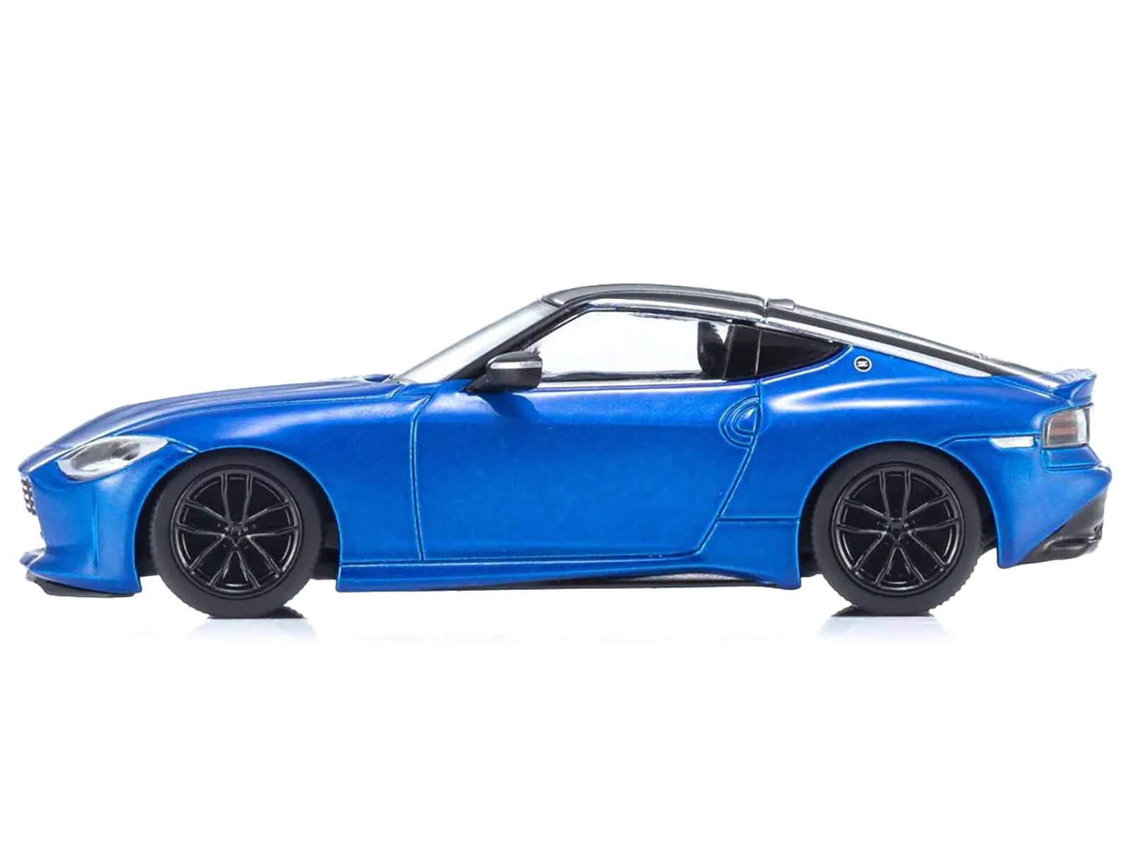Angle. Kyosho - Nissan Fairlady Z RHD (Right Hand Drive) Seiran Blue with Black Top with Mini Book No.13 1/64 Diecast Model Car - Blue with Black.