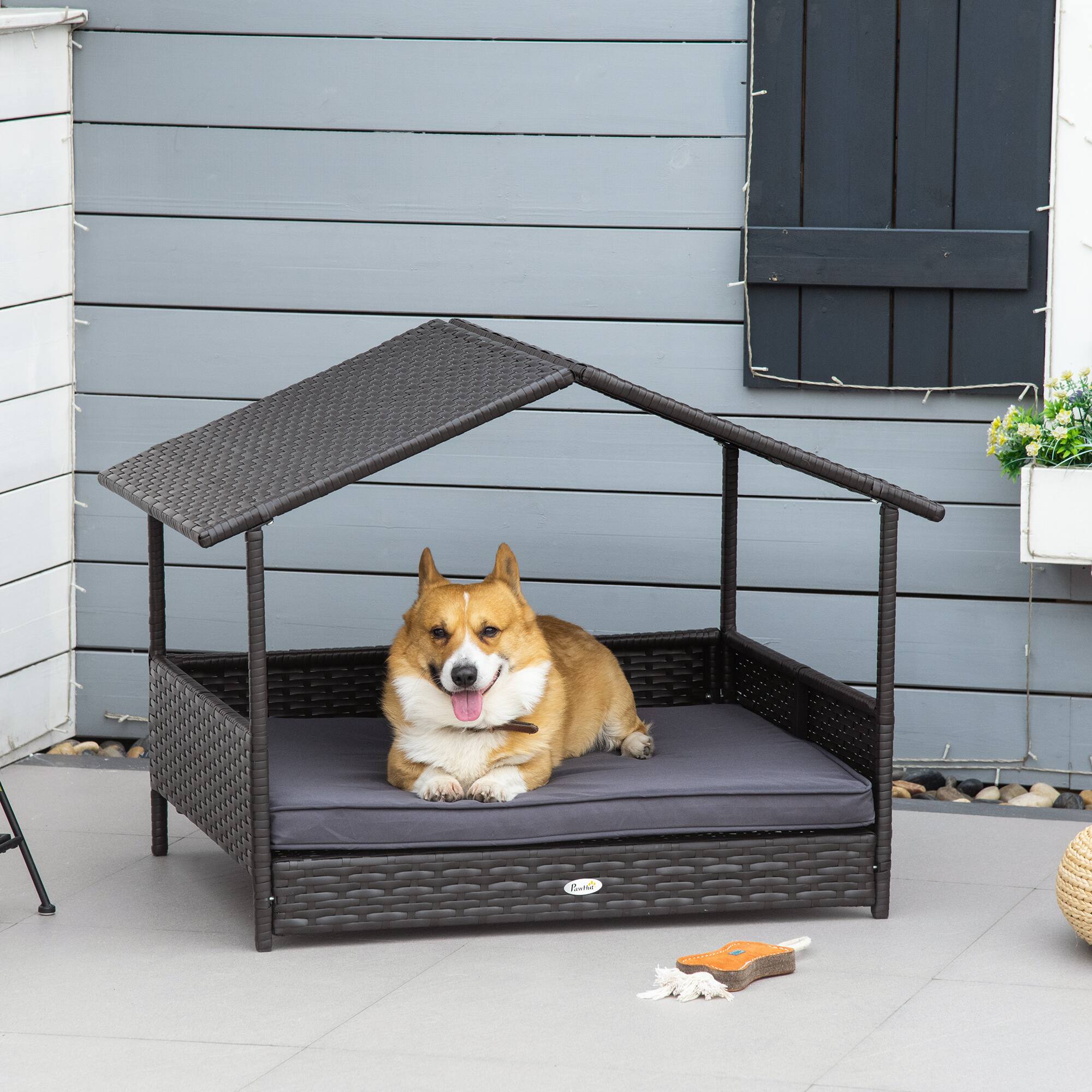 Angle. Pawhut - Wicker Dog House Outdoor, Canopy, Rattan Bed with Water-resistant Cushion, Raised, 66 lbs, 19.75", Brown - Grey.