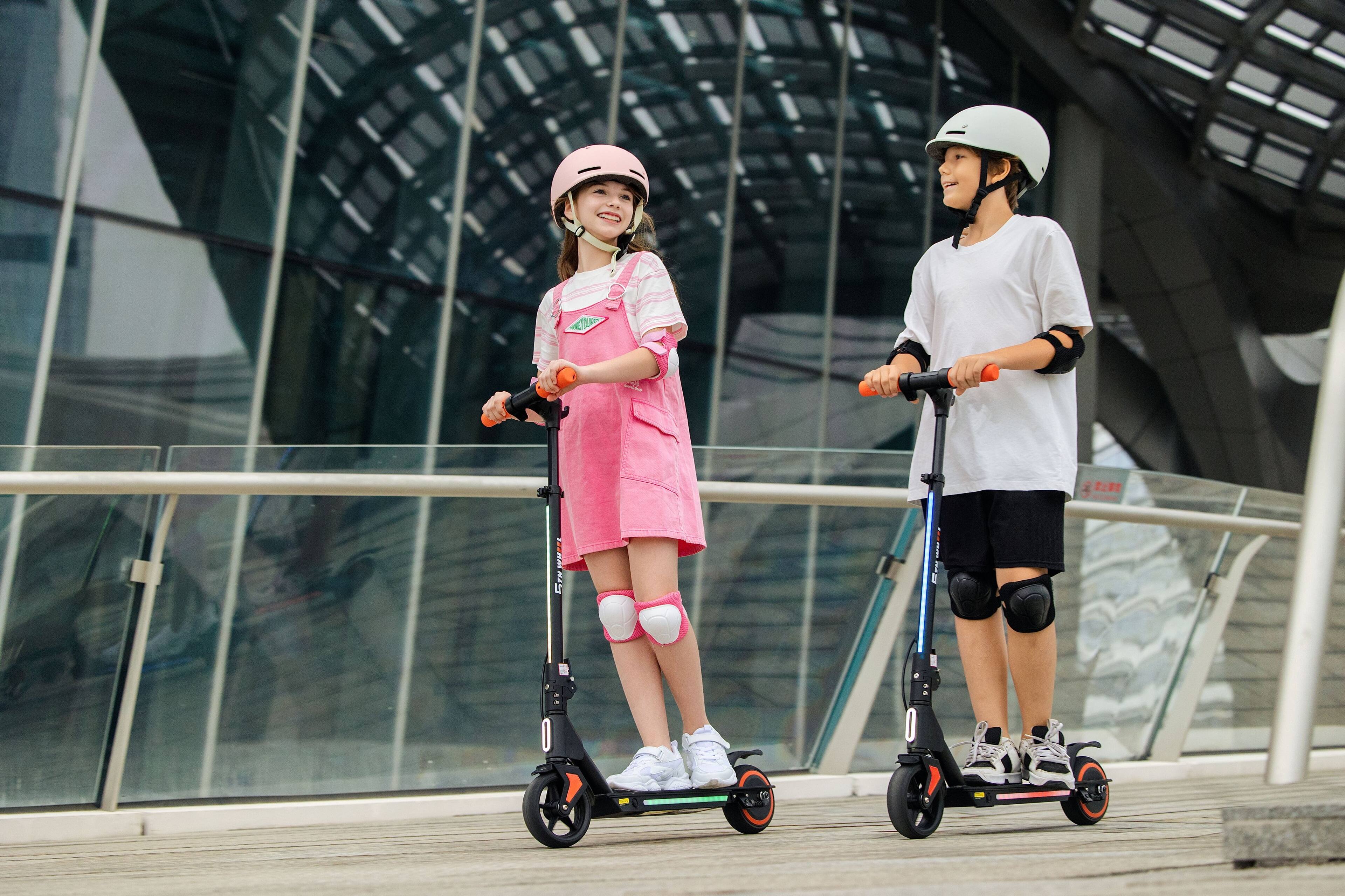 Alt View 5. 5th Wheel - K1MAX Kids Electric Scooter w/ 5 mi Max Range and 10 mph Max Speed - Black.