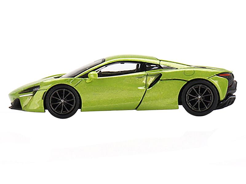 Angle. Mini GT - McLaren Artura Flux Green Metallic Limited Edition to 2040 pieces Worldwide 1/64 Diecast Model Car by Mini GT - Green Metallic.
