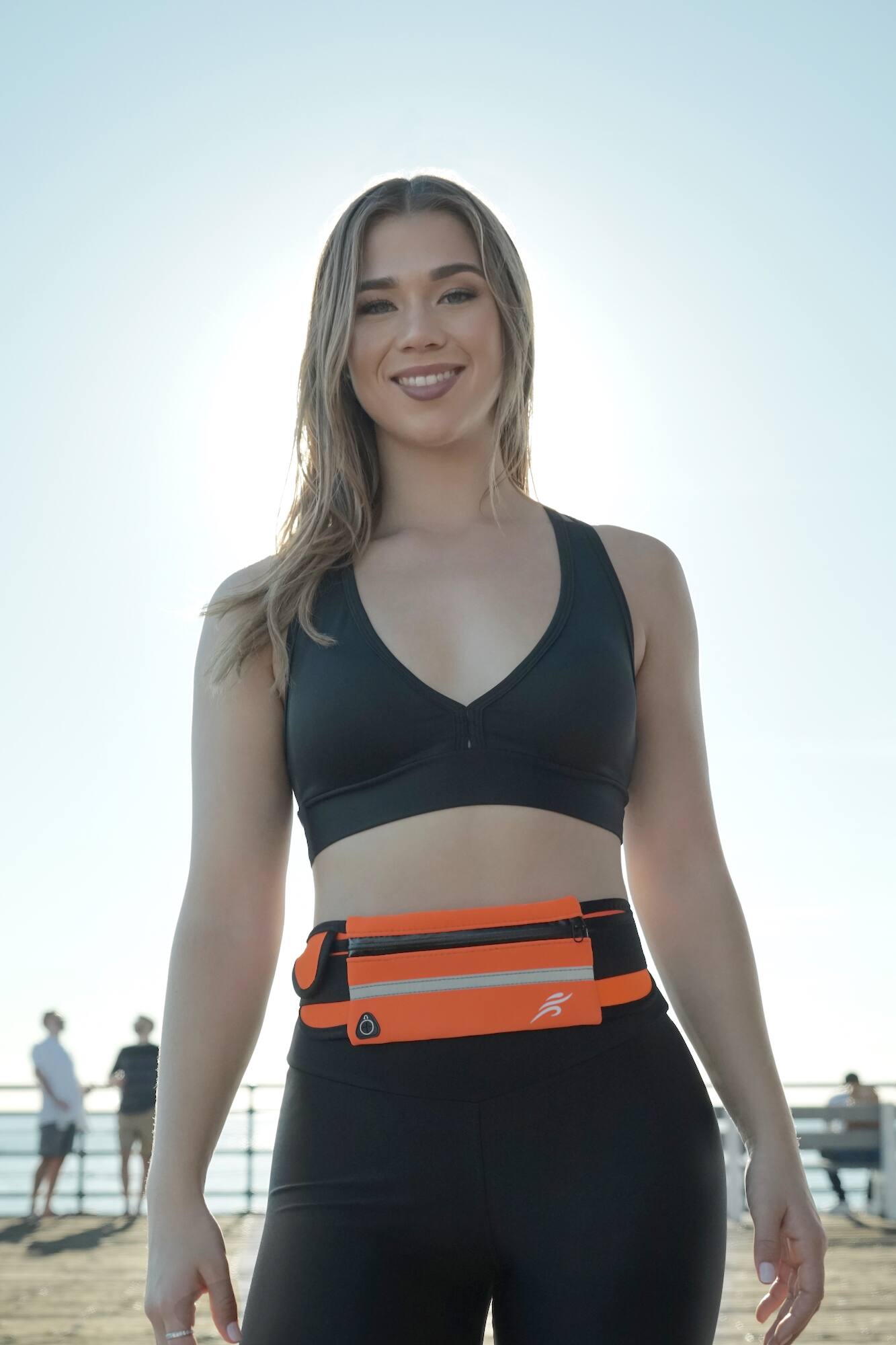 Alt View 2. JupiterGear - Sports Running Belt and Travel Fanny Pack for Jogging, Cycling and Outdoors with Water Resistant Pockets - Orange.