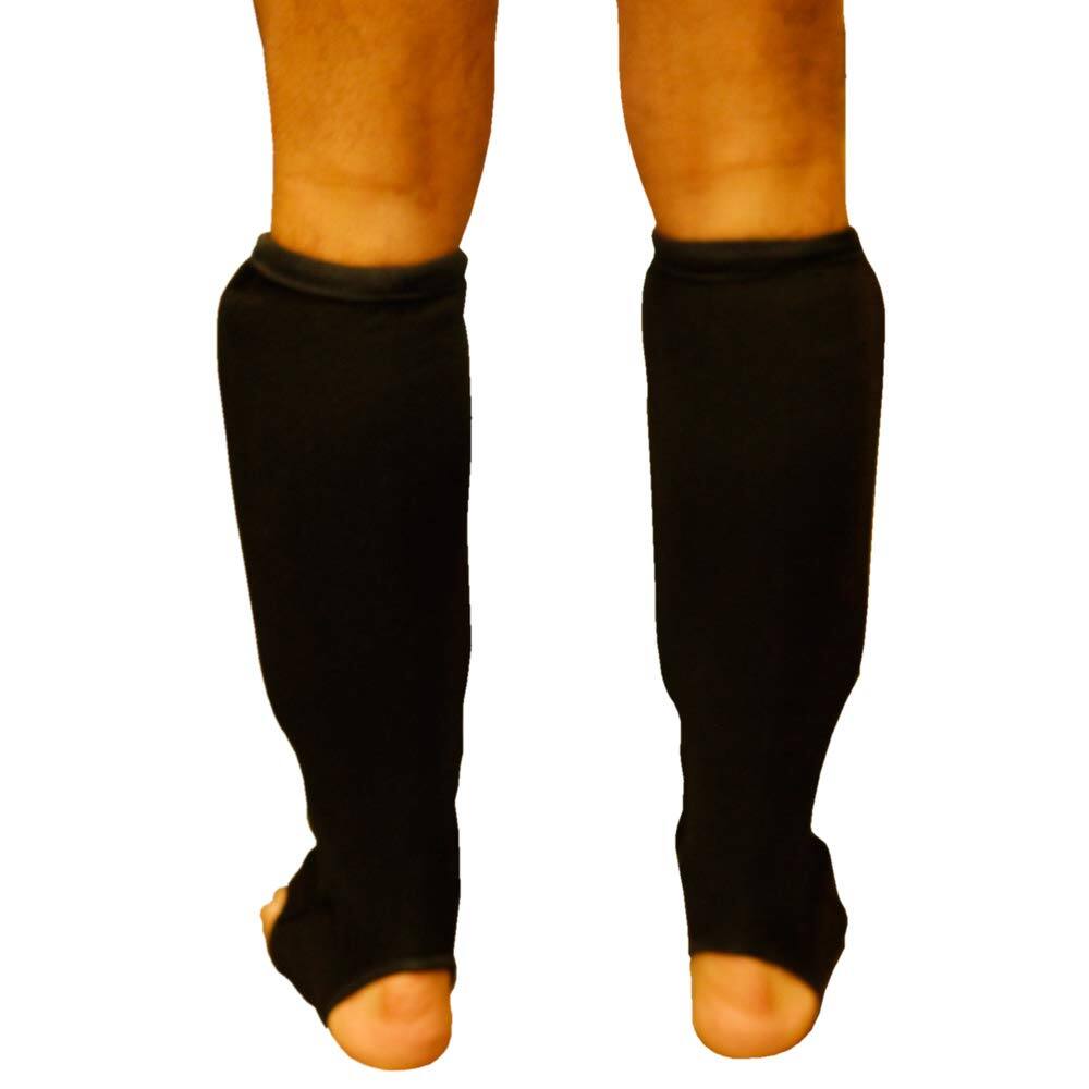 Left. Amber Sporting Goods - Nylon Shin and Instep Protectors for Muay Thai, Kickboxing, MMA, Thick Padding, Impact Protection, Pair of Shin Guards - Black.