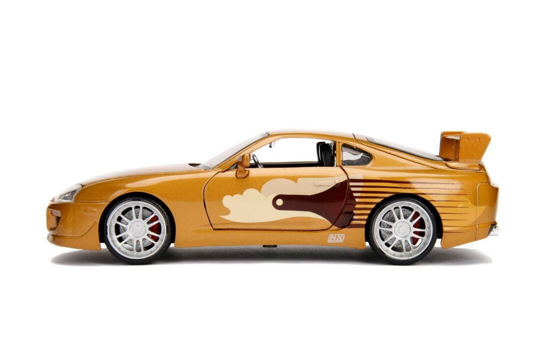 Alt View 2. Jada - Slap Jack's Toyota Supra Gold "Fast & Furious" Movie 1/24 Diecast Model Car by Jada.