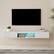 Alt View 1. Kadyn - Wall-Mounted Floating TV Stand with LED Lighting and Textured Wave Design - White.