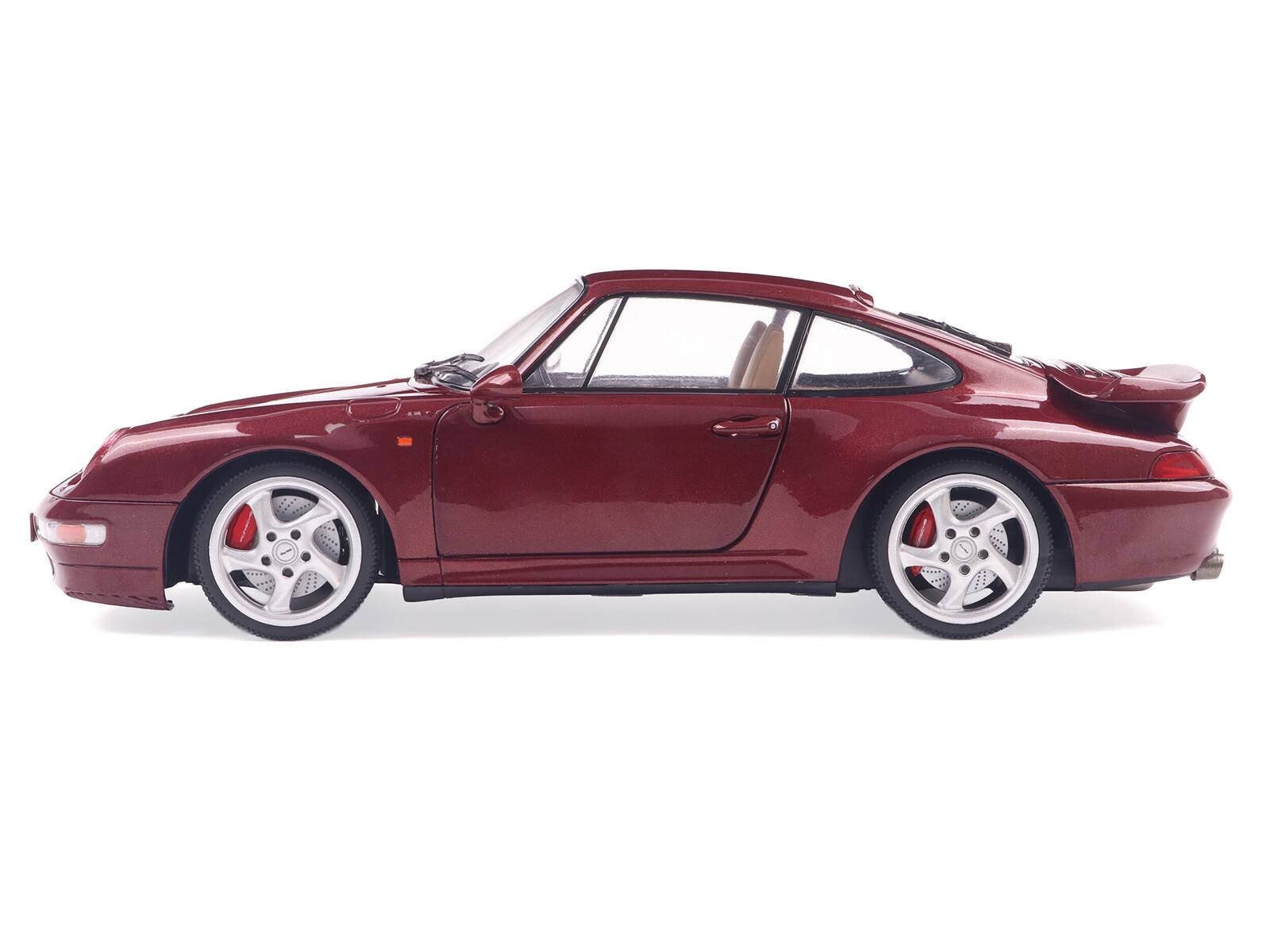 Angle. Solido - 1997 Porsche 911 (993) Turbo Arena Red Metallic 1/18 Diecast Model Car by Solido - Red Metallic.