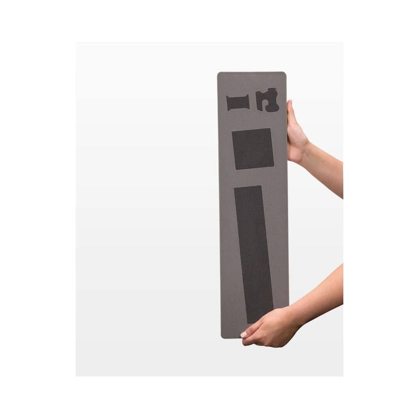 Left. AccuQuilt - Pincushion Die - Black.