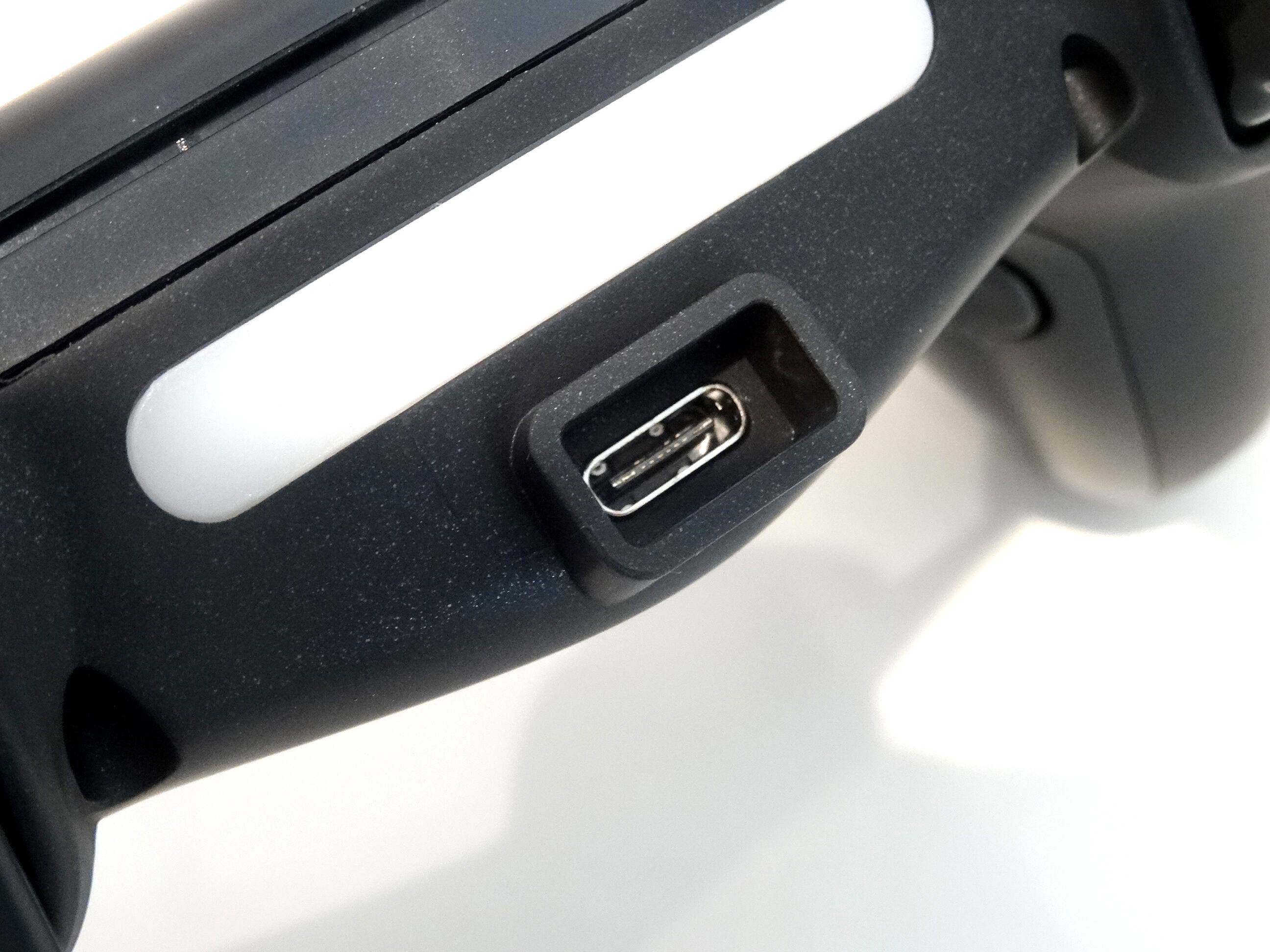 Left. Ghost Gear - GG™ PS4 / PC Pro Controller Gamepad Metallic Black - High-Speed Wired Connectivity, 4 Programmable Rear Triggers - Black.