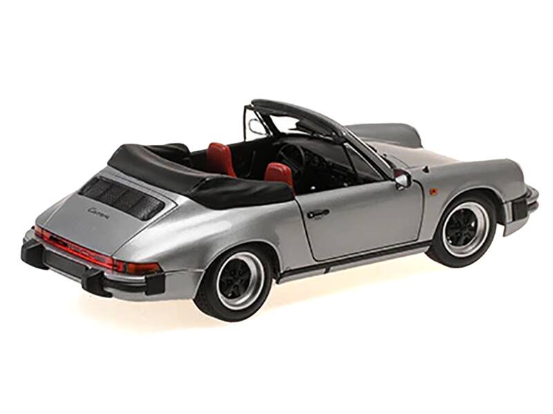 Left. Minichamps - 1983 Porsche 911 Carrera Cabriolet 3.2 Gray Metallic 1/18 Diecast Model Car by Minichamps - Gray Metallic.