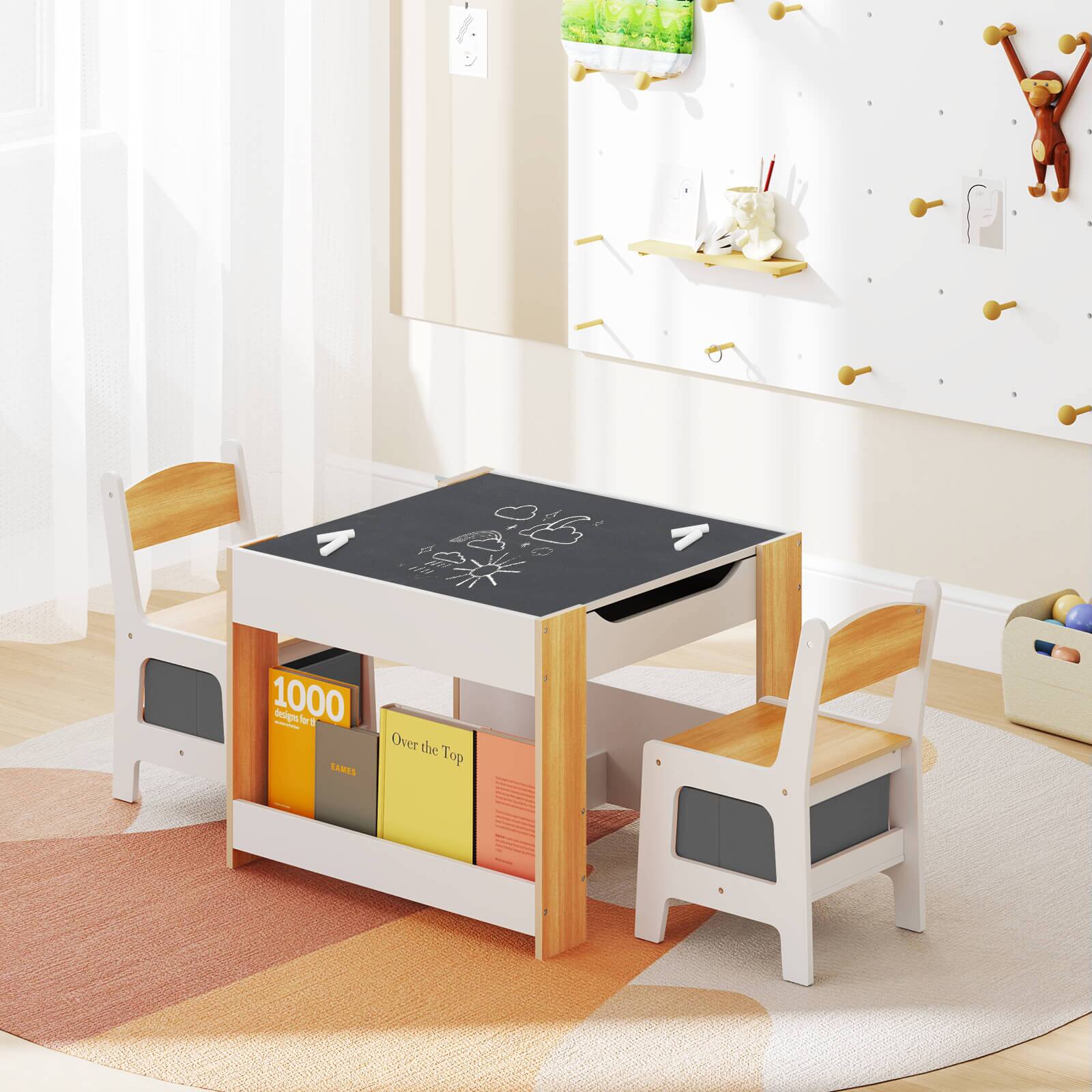 The image shows a children's playroom with a table and two chairs. The table has a blackboard on it, and there are several books scattered around the room. The chairs are positioned on either side of the table, creating a cozy and inviting space for kids to play and learn. The room also features a rug, adding to the comfort and warmth of the space.