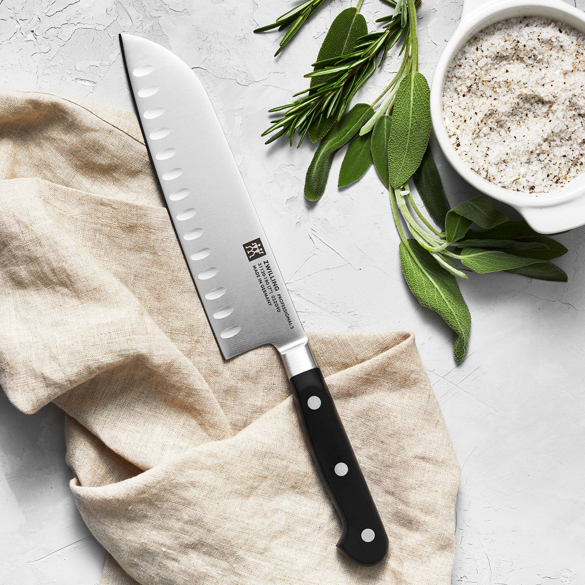 The text on the image reads:

"ZWILLING
PROFESSIONAL
SANTOKU
1201
ZWILLING
GERMANY"