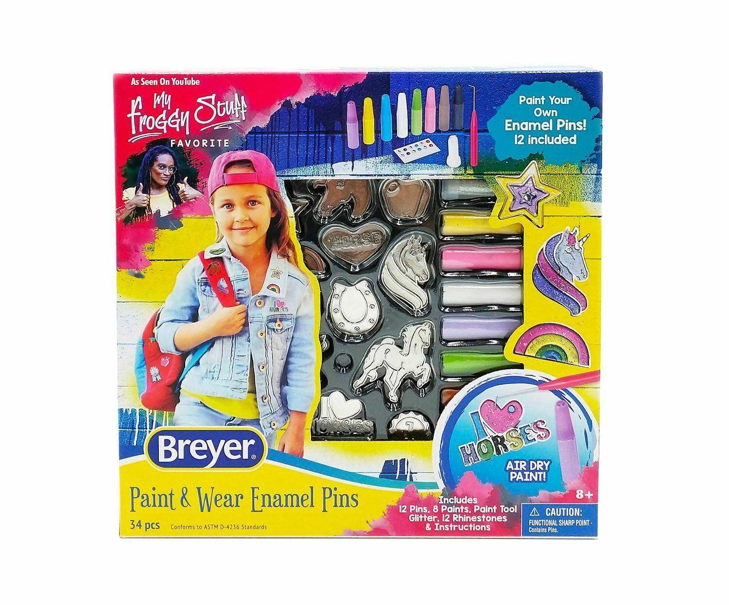 As Seen On YouTube  
MY FAVORITE  
Paint Your Own Enamel Pins!  
12 included  

Breyer  
Paint & Wear Enamel Pins  
34 pcs  
Conforms to ASTM D-4256 Standards  

HORSES  
AIR DRY PAINT!  

Includes  
12 Pins, 8 Paints, Paint Tool, Glitter, 12 Rhinestones & Instructions  

CAUTION:  
FUNCTIONAL SHARP POINT  
Contains Paint  

8+