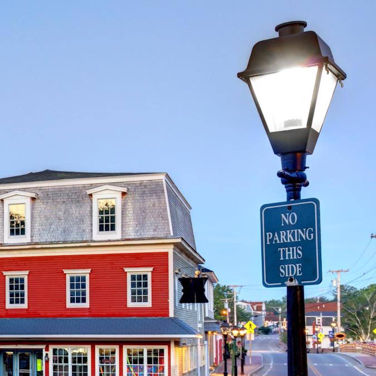 NO PARKING THIS SIDE