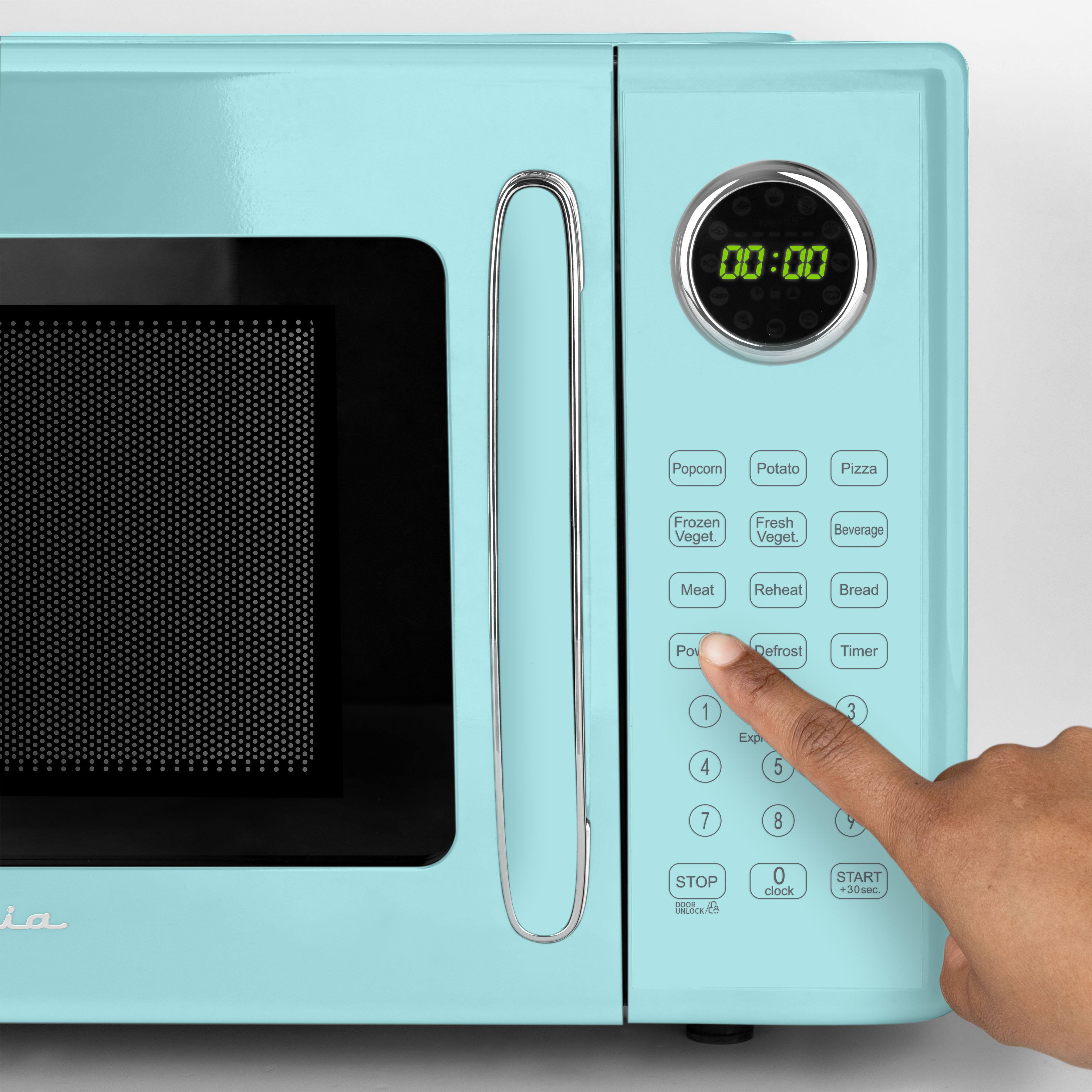 00:00 Popcorn Potato Pizza Frozen Veget. Fresh Veget Beverage Meat Reheat Bread Power Defrost Timer 1 2 3 4 5 6 7 8 9 STOP - LOK 0 clock START 0sc