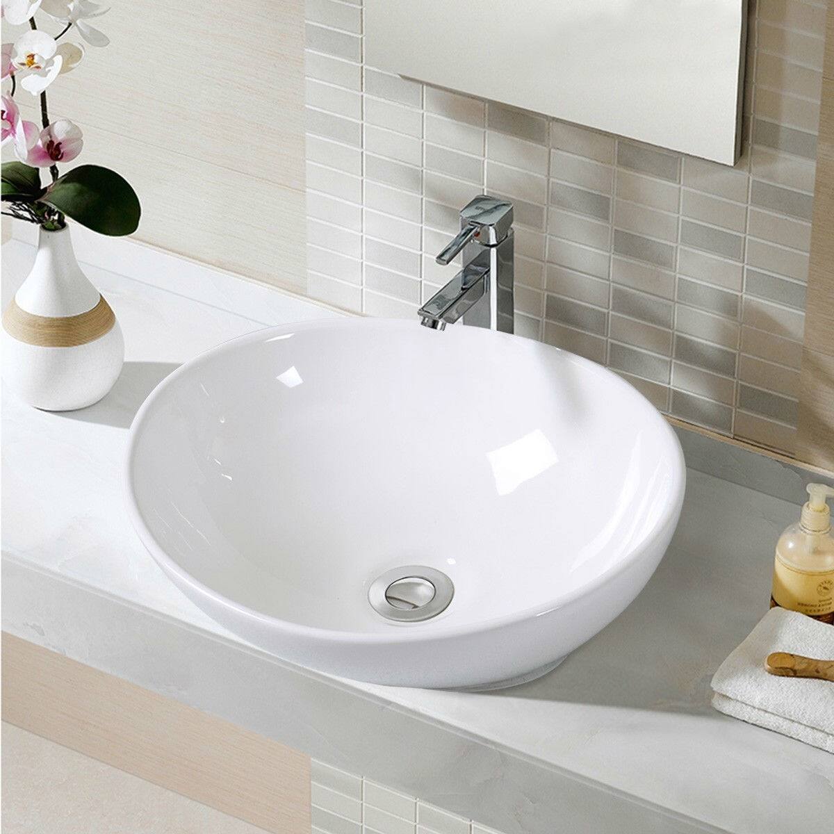 Left. Hivvago - Contemporary Oval Basin Round Vessel Bathroom Sink in White - White.