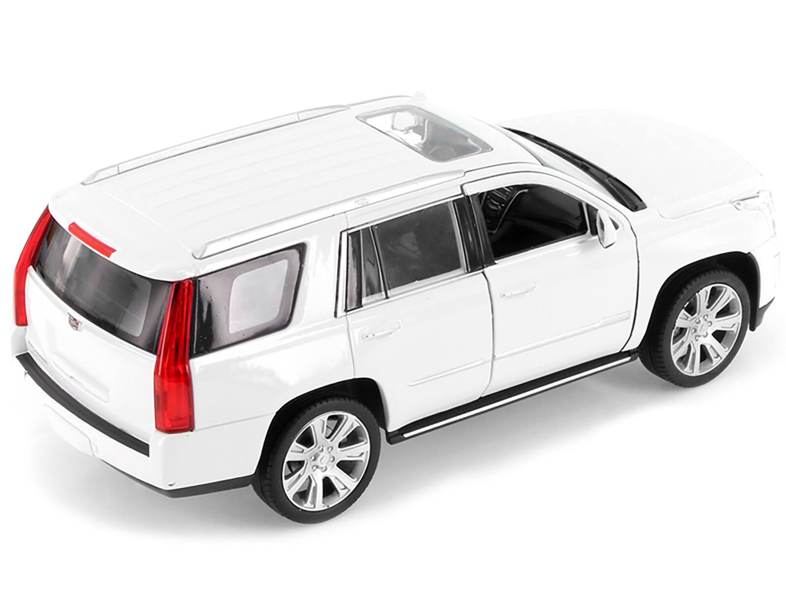 Left. Welly - 2017 Cadillac Escalade with Sunroof White 1/24-1/27 Diecast Model Car by Welly - White.