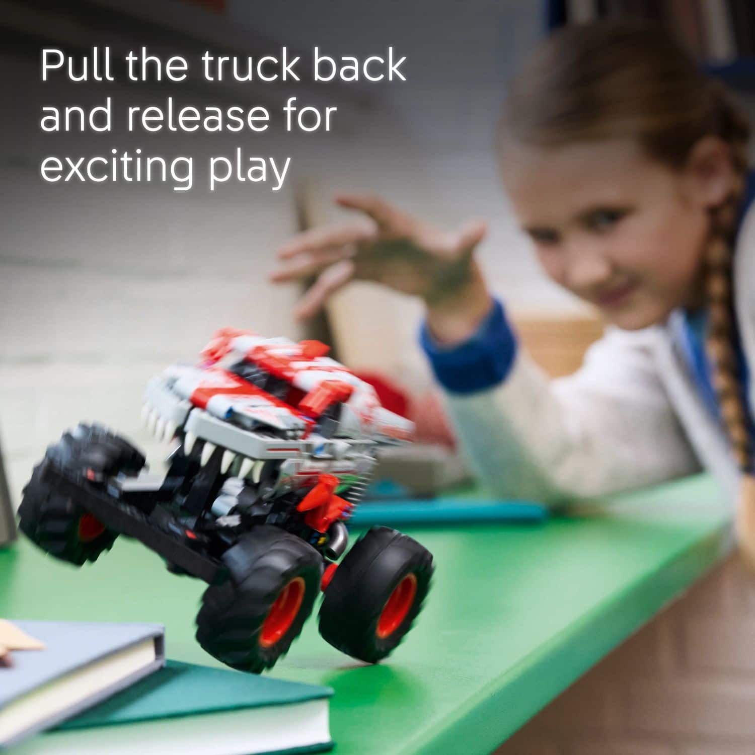 "Pull the truck back and release for exciting play."