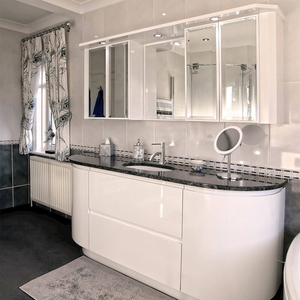 Left. Whitehaus - Round Freestanding Led 5X Magnified Mirror - Silver.