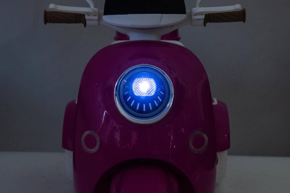 Alt View 1. BreeBe - 12V Kids Electric Motorcycle, 3-Wheel Ride On Scooter w/ USB, Bluetooth, Lights, Storage, Dual Motor, 2 Seats, Ages 3+ - Rose.