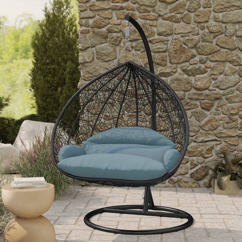 Left. LeisureMod - Recluse Modern Wicker Teardrop Hanging Egg Chair with Stand - Outdoor Indoor Swing Chair & Cushion - Charcoal Blue.